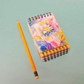 Блокноти на пружині А7