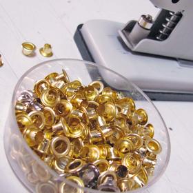 Встановлення люверсів